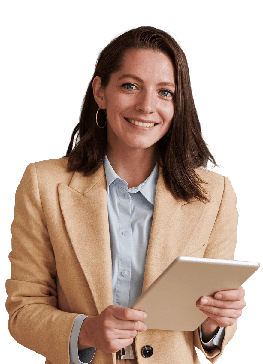 Smiling person holding a tablet, wearing blazer.